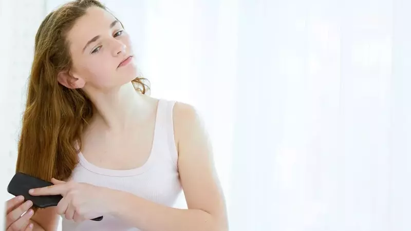 The $8 Hair Wax Stick Teenagers Swear By for Effortless 'Clean Girl' Hair