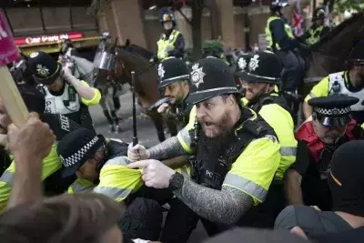 UK Migrant Crisis: Protests Erupt, Government Scrambles for Solutions