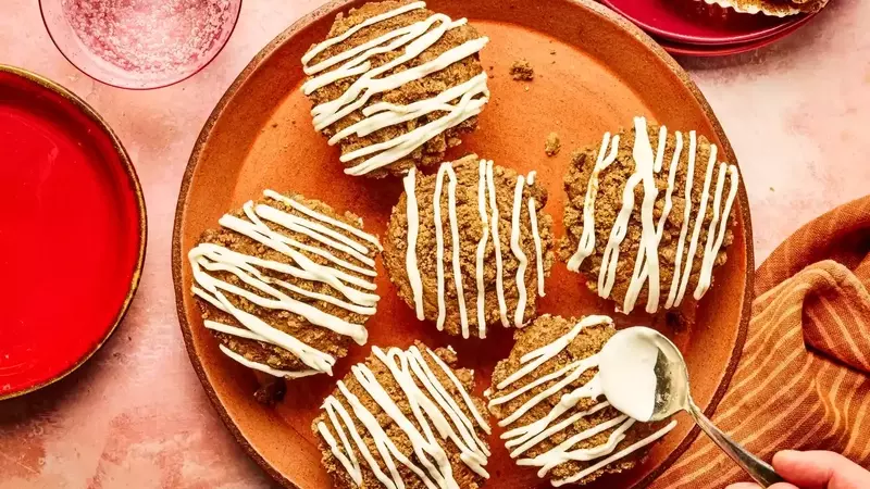 Delectable Gingerbread Muffins with Streusel Topping and Cream Cheese Glaze