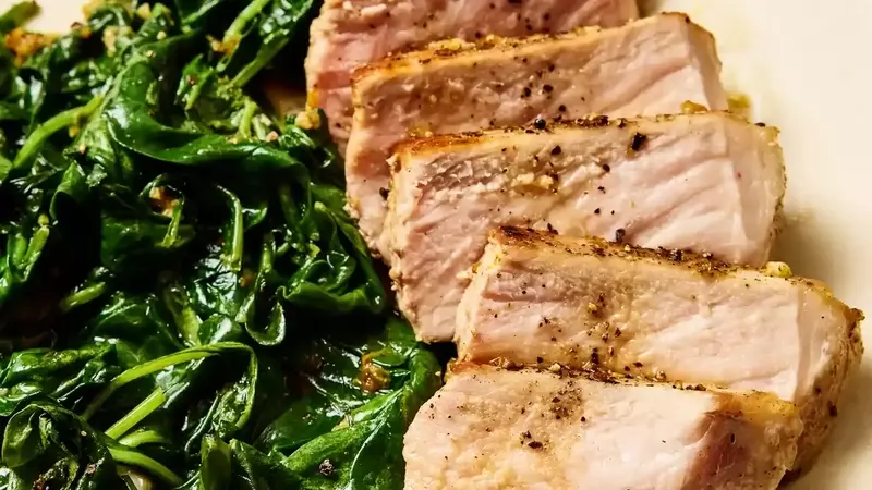 Quick One-Pan Garlic-Butter Pork Chops with Sautéed Spinach