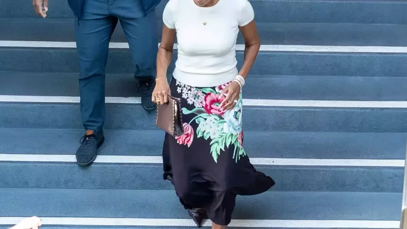 Michelle Obama Redefines Professional Attire with Chic Slip Skirt Ensemble
