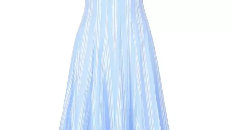 Taylor Swift's Spring Fashion Statement: The Staud Wells Midi Dress