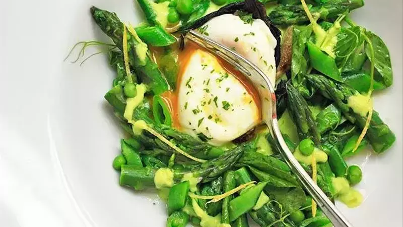 Crafting a Vibrant Spring Salad with Blanched Vegetables and Poached Eggs