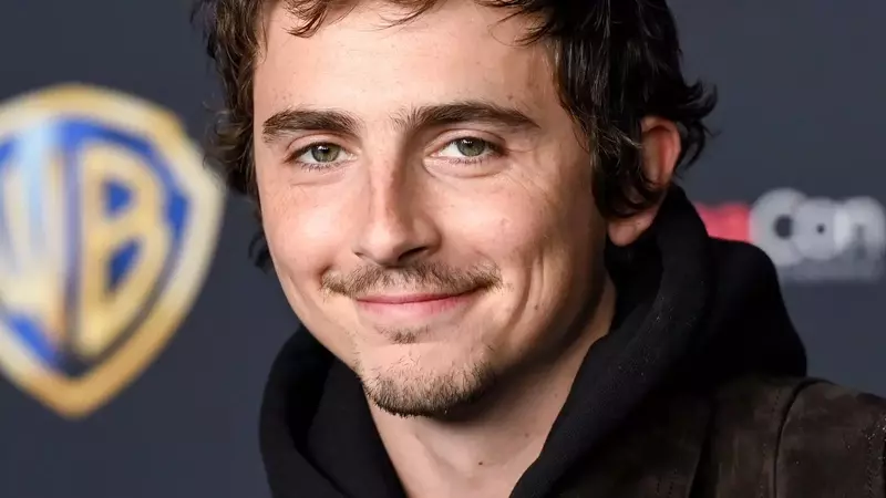 Timothée Chalamet's Hair Evolution: From Buzz Cut to Knicks Game Style