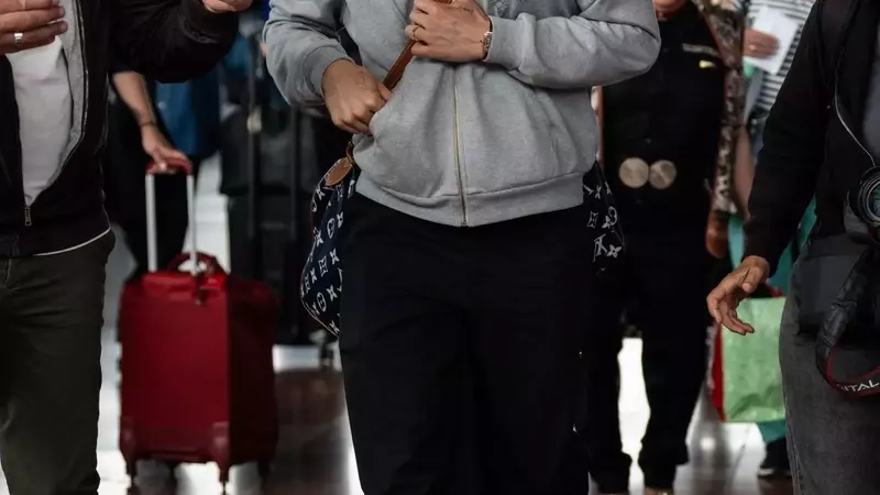 Charles Melton's Cannes Comfort Style with Hoka Sneakers