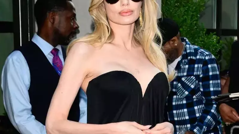 Angelina Jolie Shines in Black Gown at 'Couture' Screening
