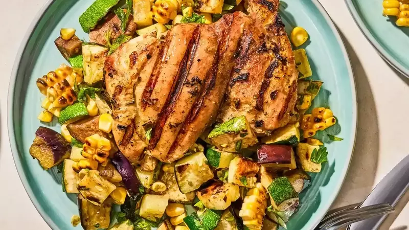Flavorful Herb-Marinated Chicken Thighs with Grilled Vegetable Medley