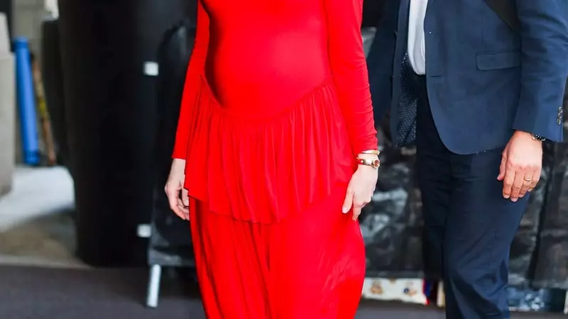 Anne Hathaway's Bold Maternity Style Debut in Red