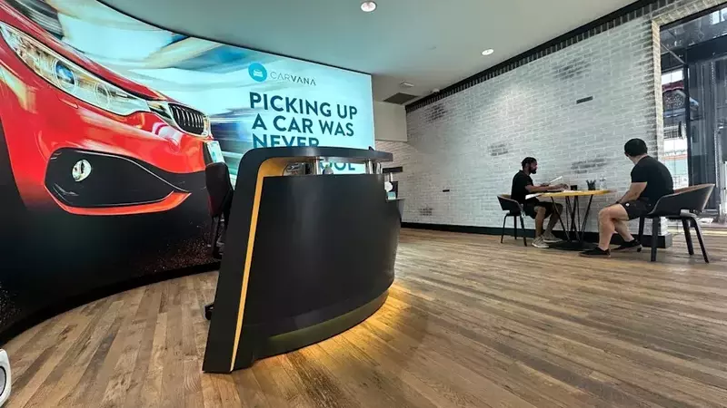 Carvana's Stock Dips Despite Record Quarter Amidst Disappointing Future Projections